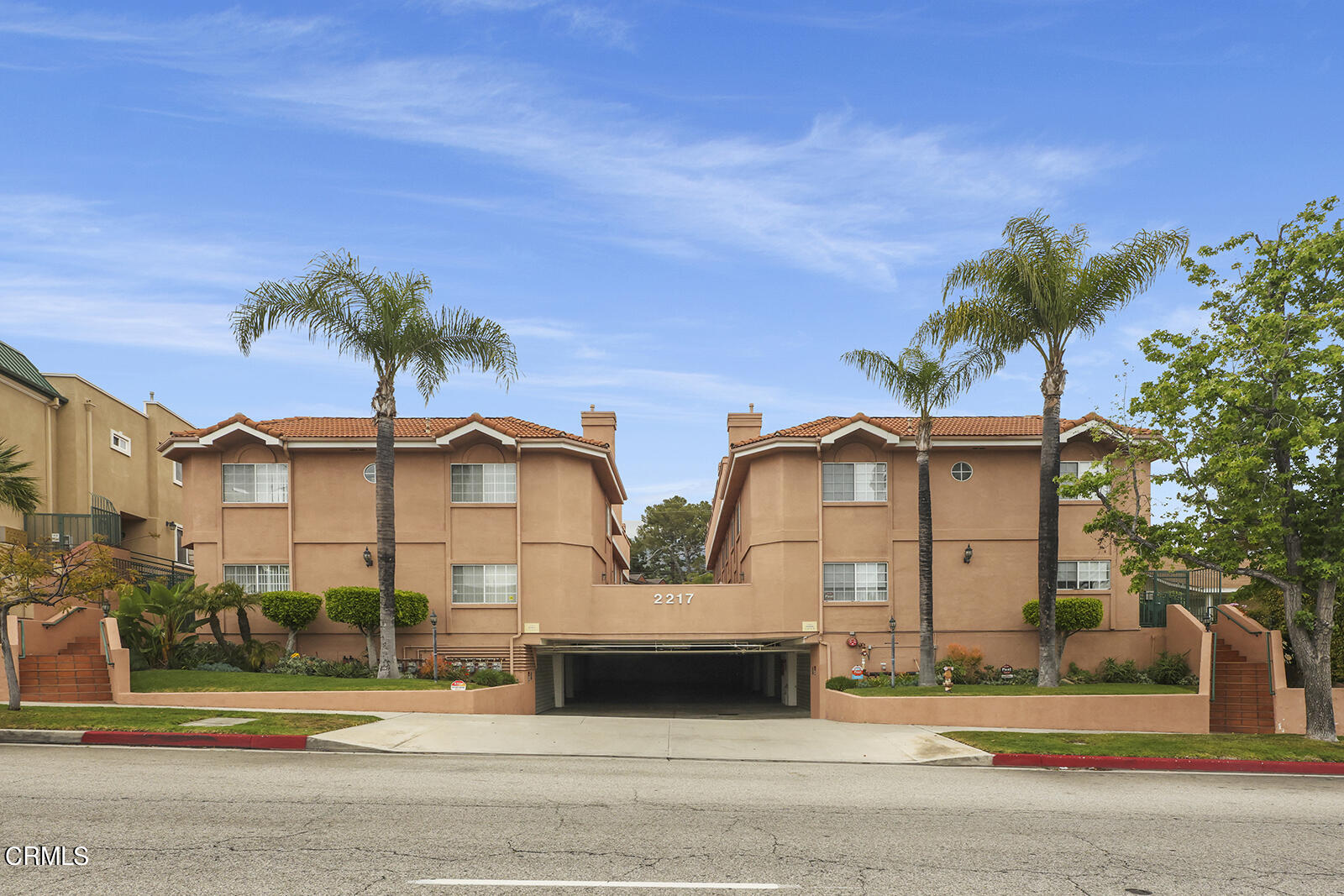 2217 Montrose Avenue, Unit 7 Montrose, CA 91020 - Photo 1 of 2 a front view of a house with a garden and tree