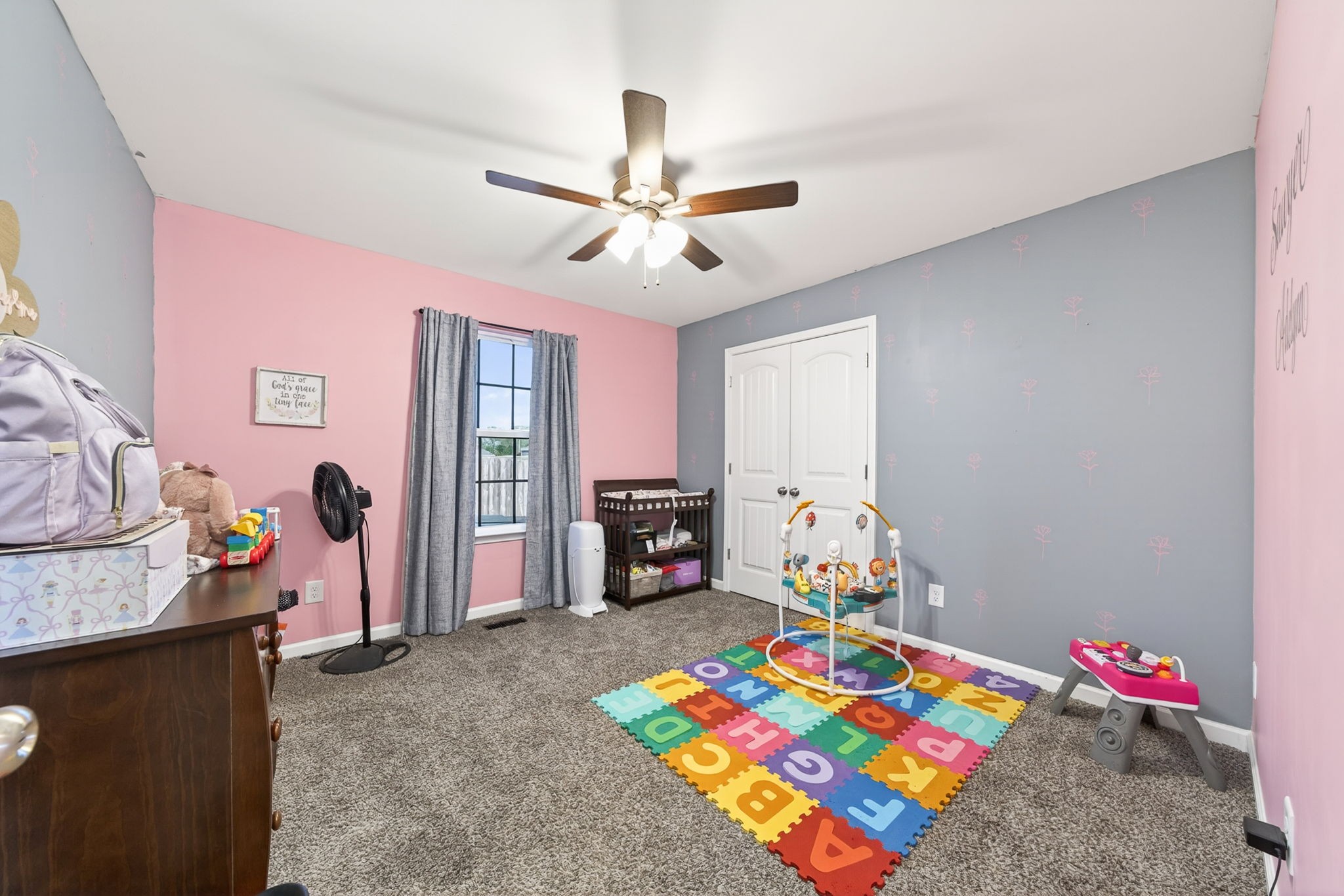 144 Liberty Road Sparta, TN 38583 - Photo 12 of 24 a bedroom with bed and a chandelier