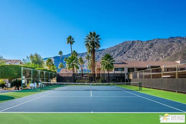 a view of swimming pool and outdoor seating