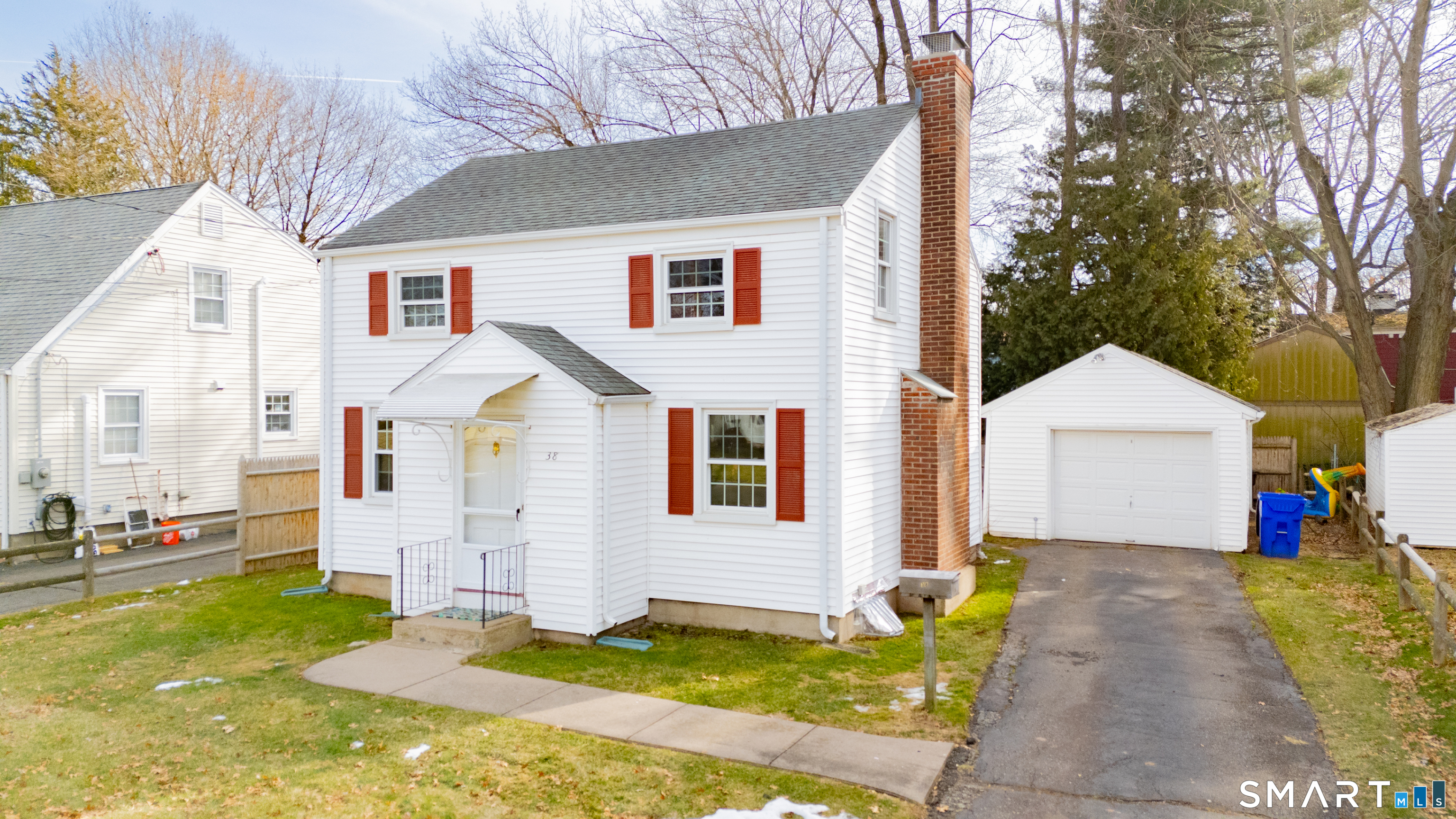 38 Wheeler Road Wethersfield, CT 06109 - Photo 9 of 28 a view of an white house with a yard