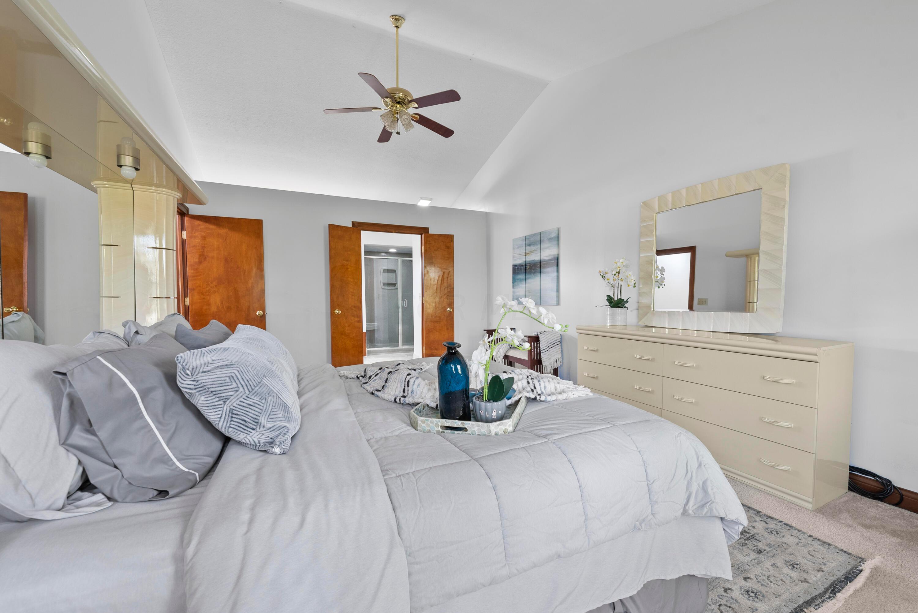 379 Beecher Road Columbus, OH 43230 - Photo 23 of 52 Large primary bedroom with vaulted ceilings