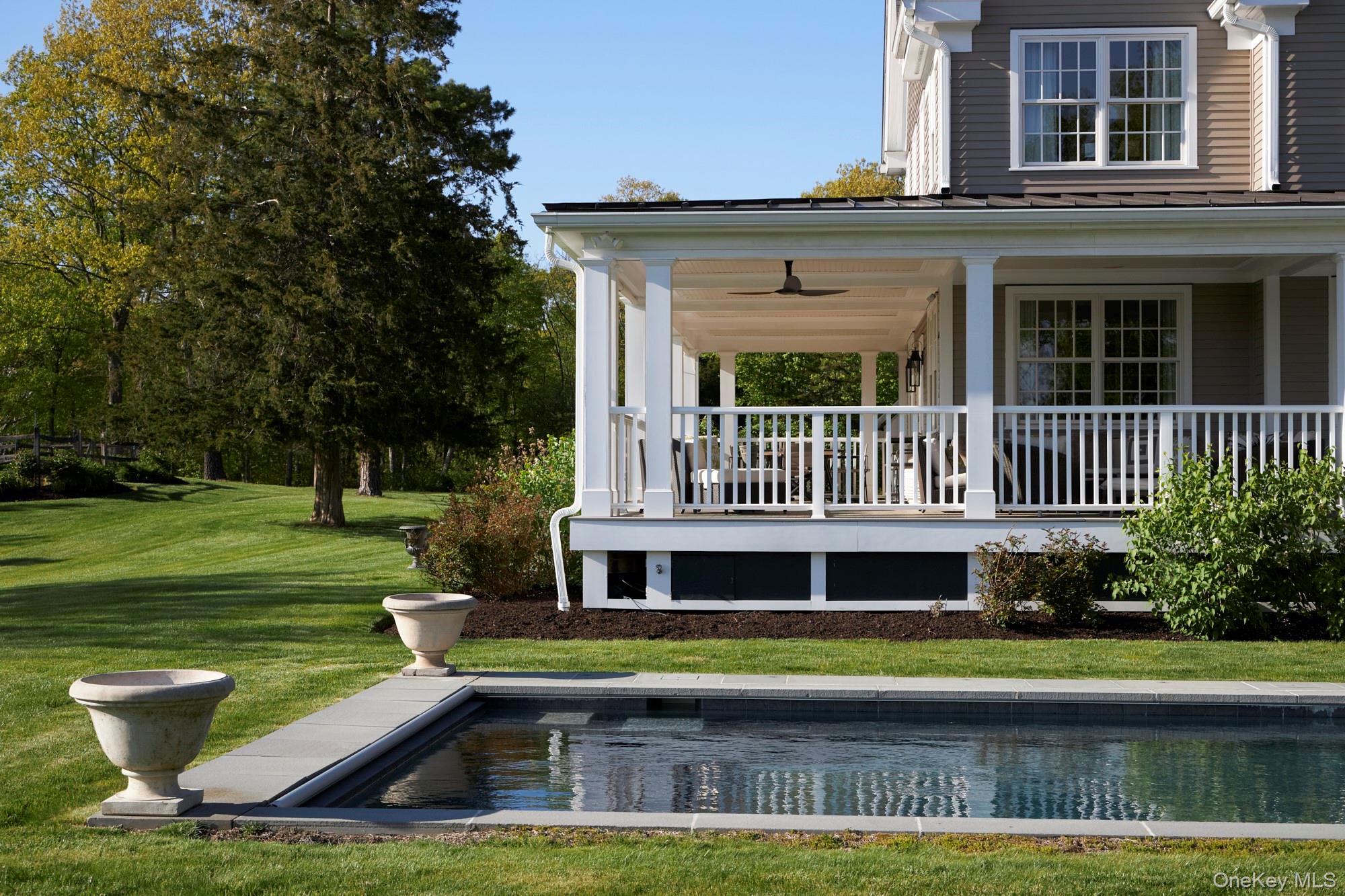 790 Stanford Road Millbrook, NY 12545 - Photo 18 of 50 a view of a house with a swimming pool