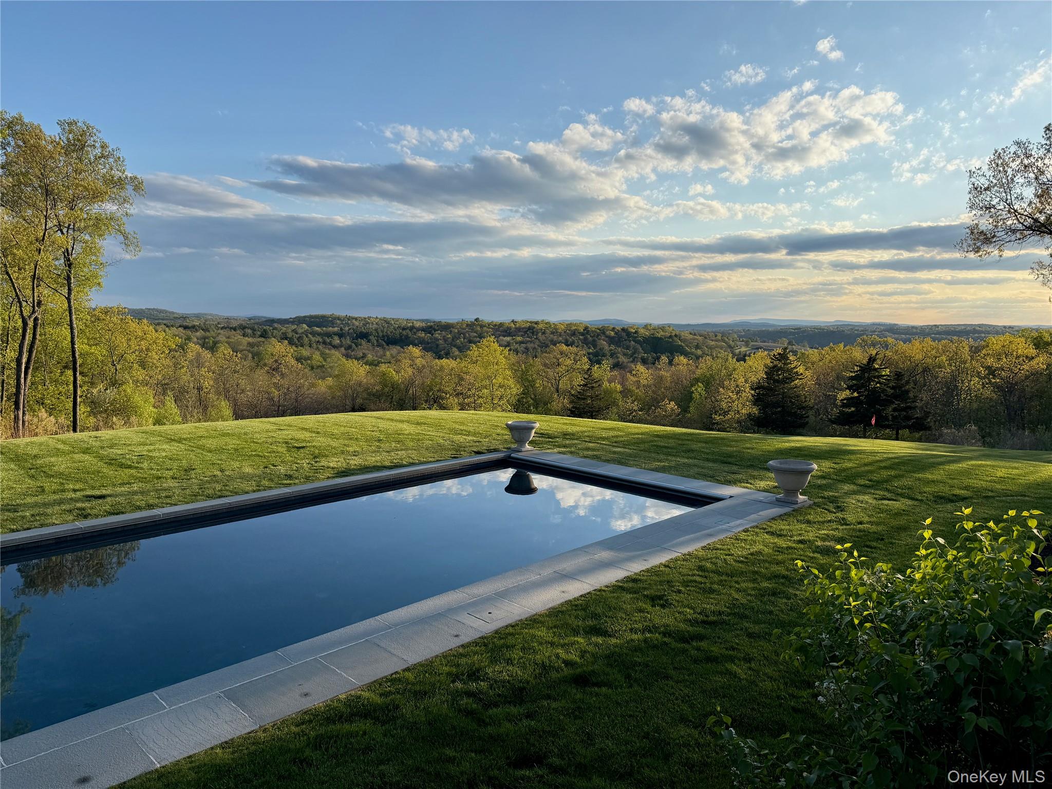 790 Stanford Road Millbrook, NY 12545 - Photo 2 of 50 a view of a garden and lake