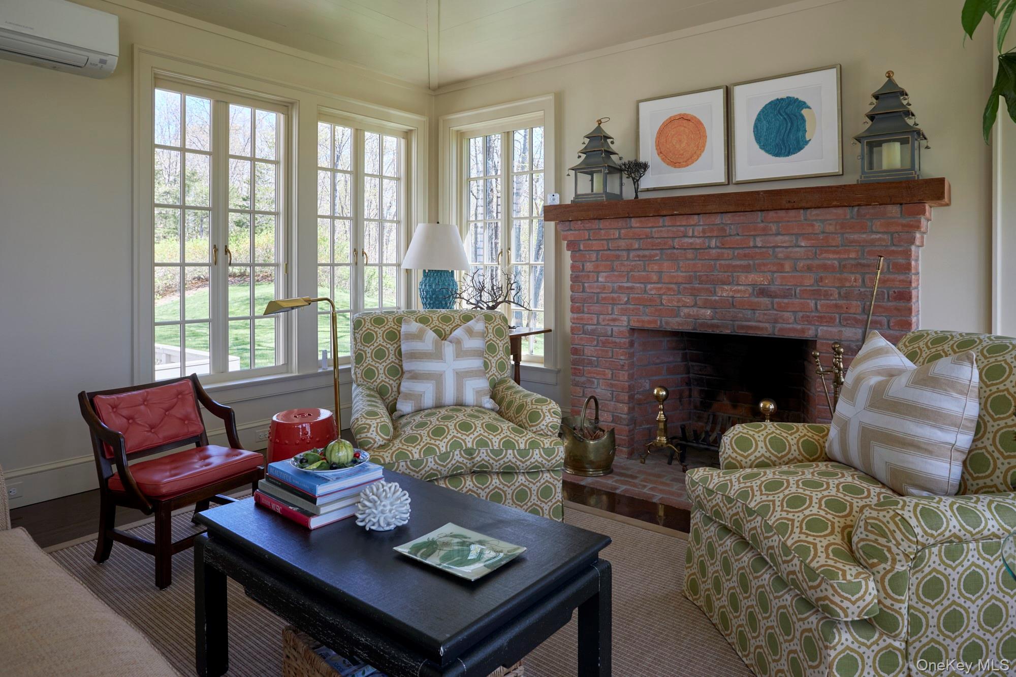 790 Stanford Road Millbrook, NY 12545 - Photo 24 of 50 a living room with furniture and a fireplace