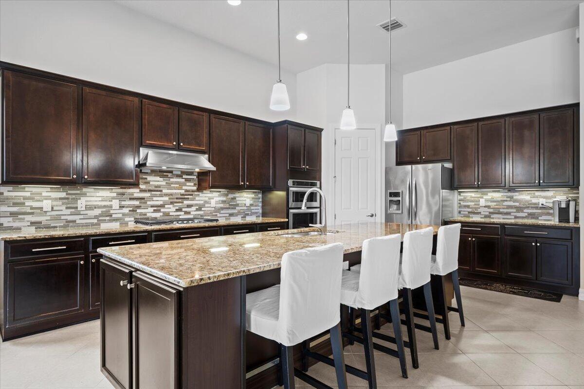 10557 Pisa Road Wellington, FL 33414 - Photo 8 of 37 08-LUX_4982