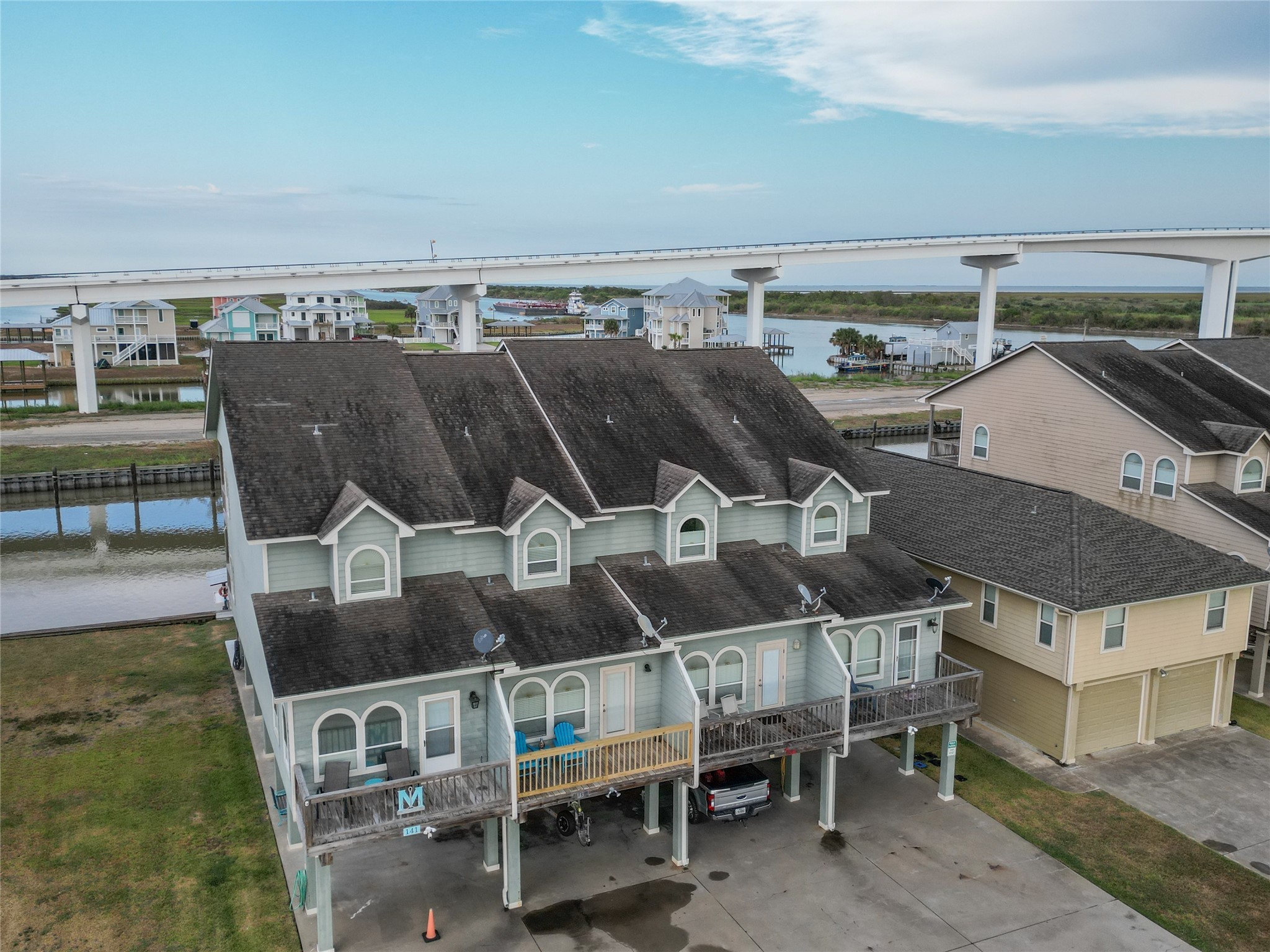 143 Boat Slip Road Matagorda, TX 77457 - Photo 2 of 31 a view of a terrace with chairs