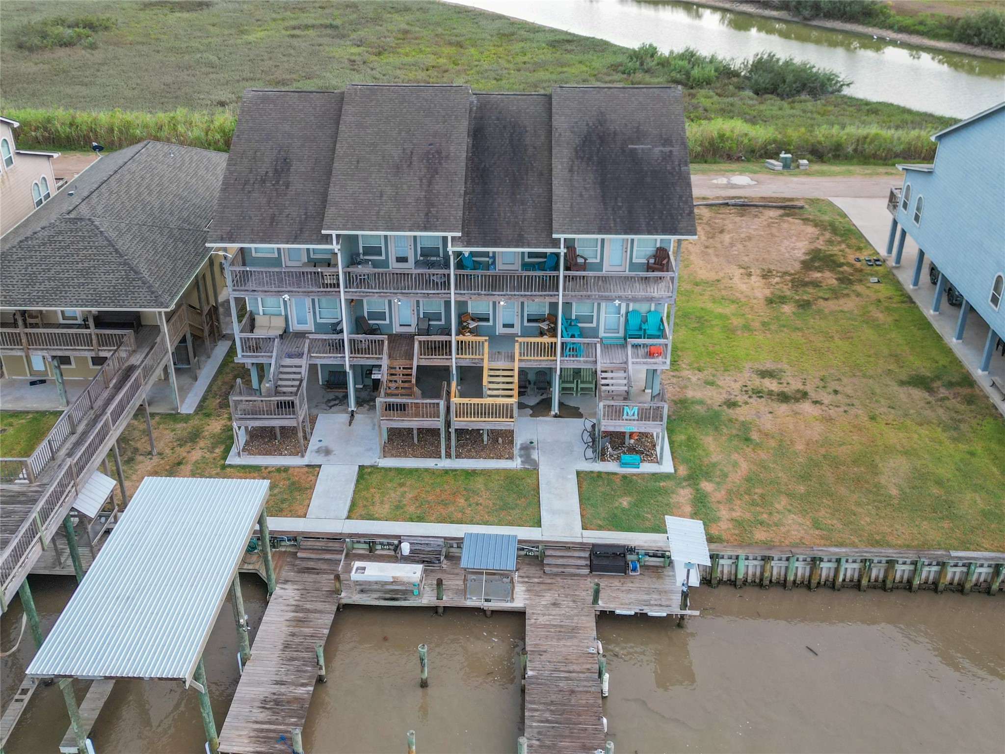 143 Boat Slip Road Matagorda, TX 77457 - Photo 29 of 31 a view of pool with seating area