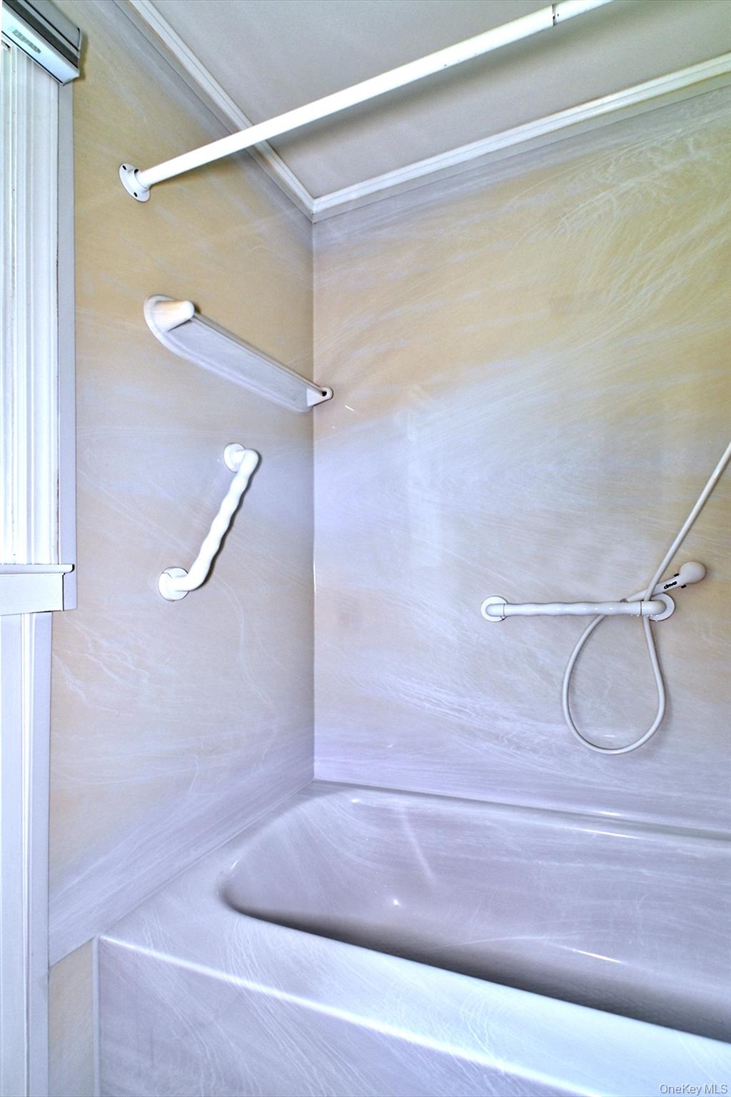 20 Valentine Road Shoreham, NY 11786 - Photo 17 of 39 Updated Bath with Shower and Tub. Hand Grips for Safety