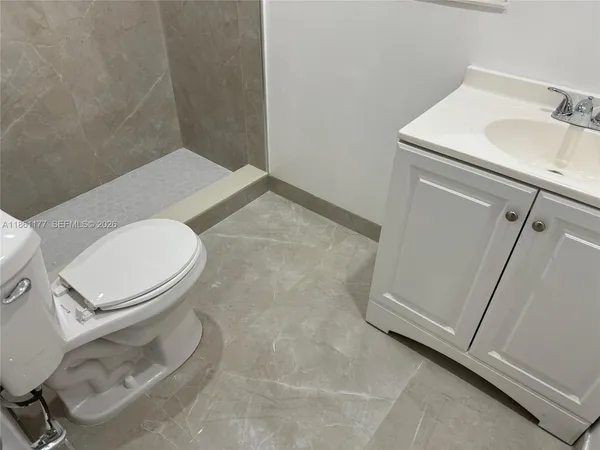 a bathroom with a sink and a vanity