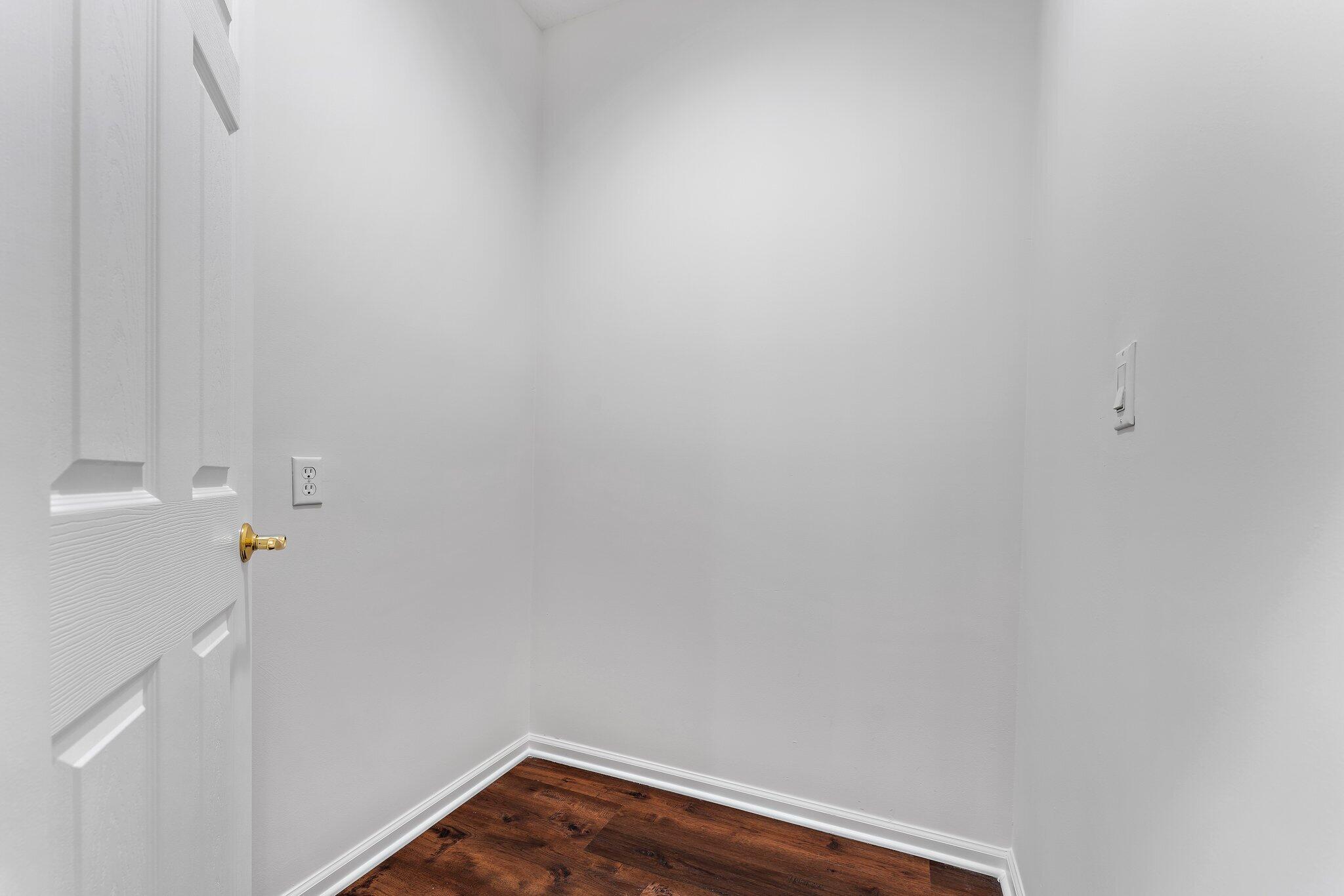 15784 Alexander Run Jupiter, FL 33478 - Photo 26 of 44 a view of small space with racks on the wall