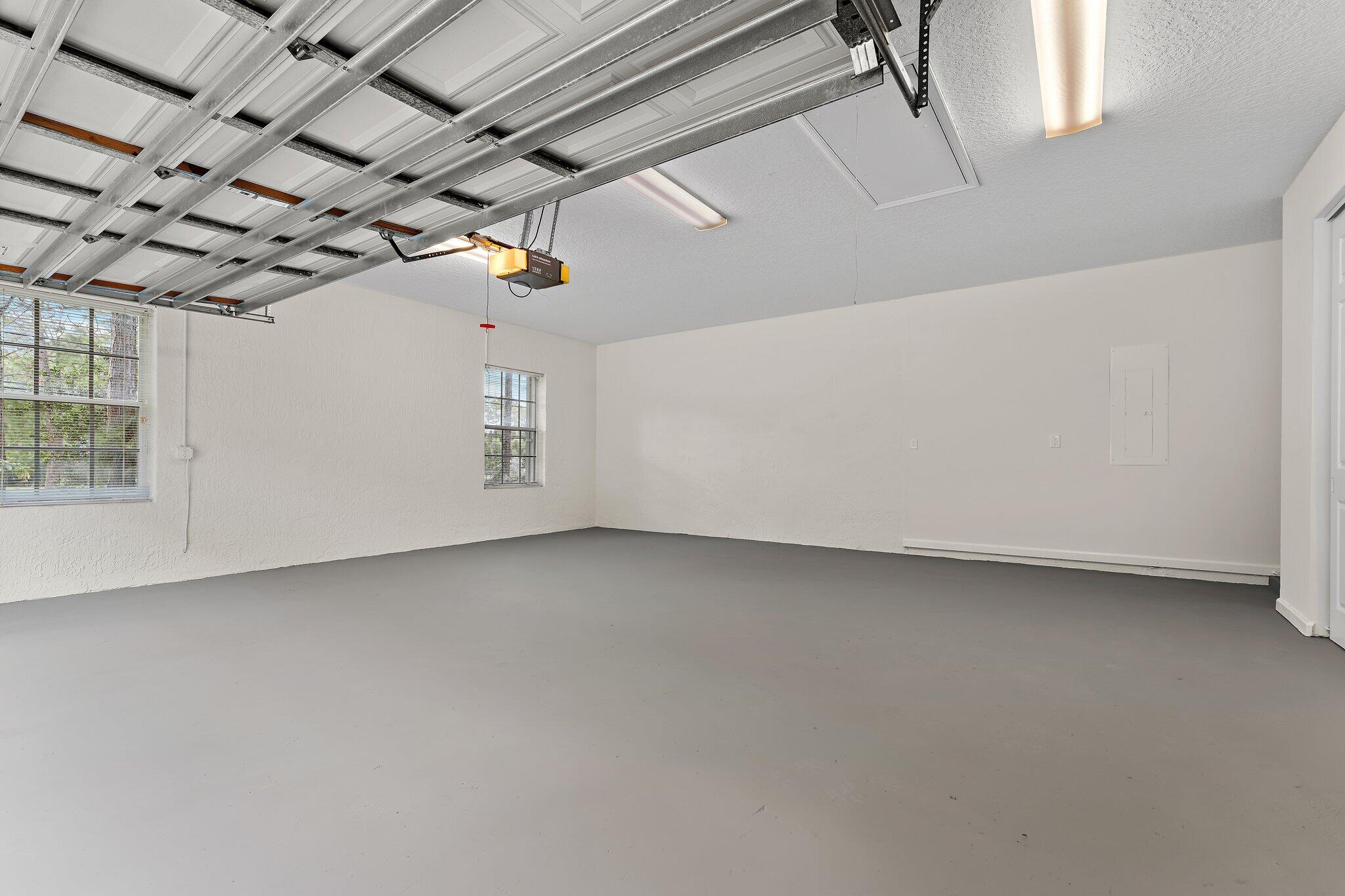 15784 Alexander Run Jupiter, FL 33478 - Photo 32 of 44 a view of a utility room with windows
