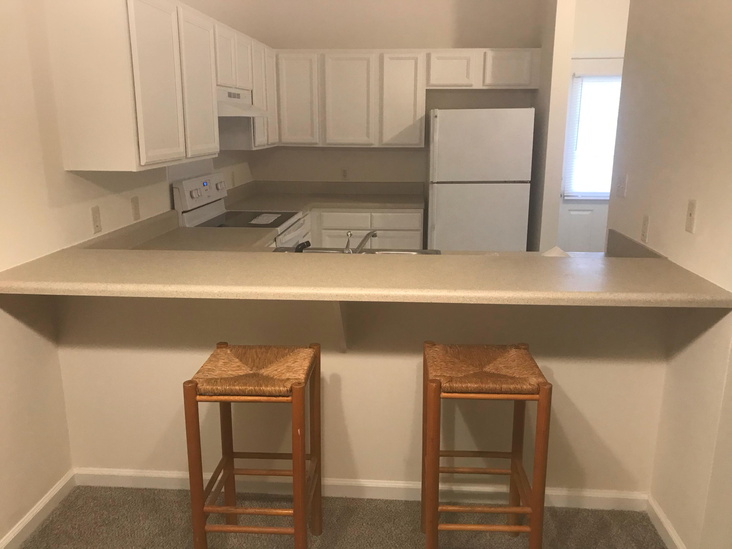 34 Heron's Watch Way, Unit 3203 Santa Rosa Beach, FL 32459 - Photo 5 of 12 a kitchen with a sink and cabinets
