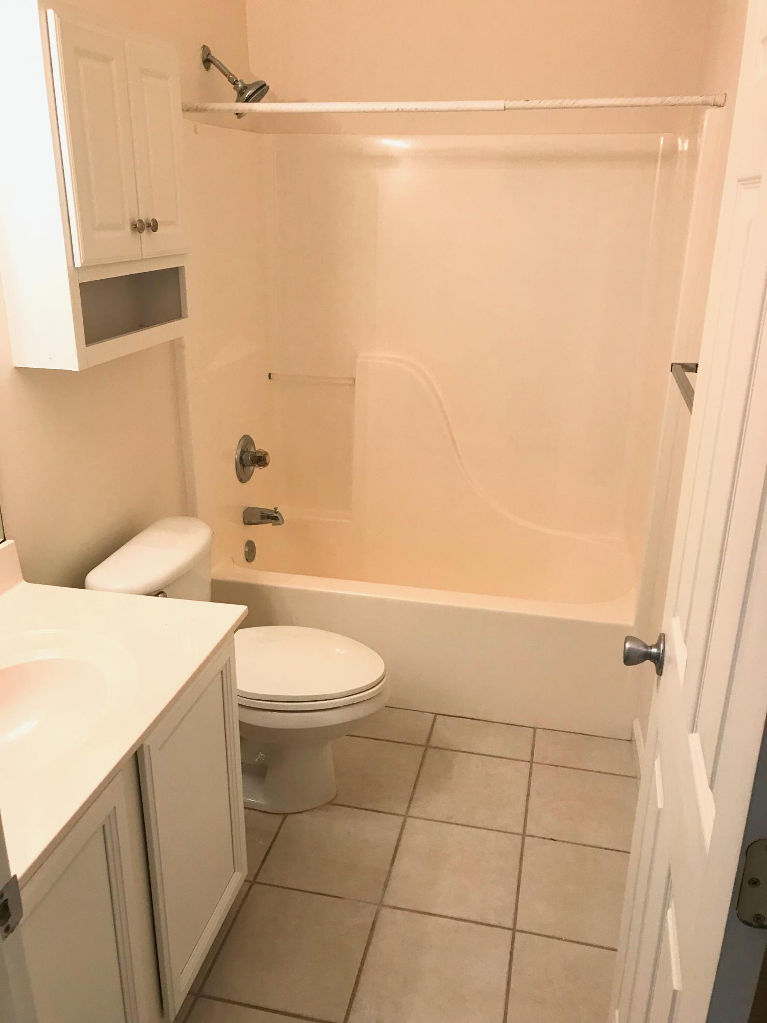 34 Heron's Watch Way, Unit 3203 Santa Rosa Beach, FL 32459 - Photo 9 of 12 a bathroom with a toilet a sink and shower