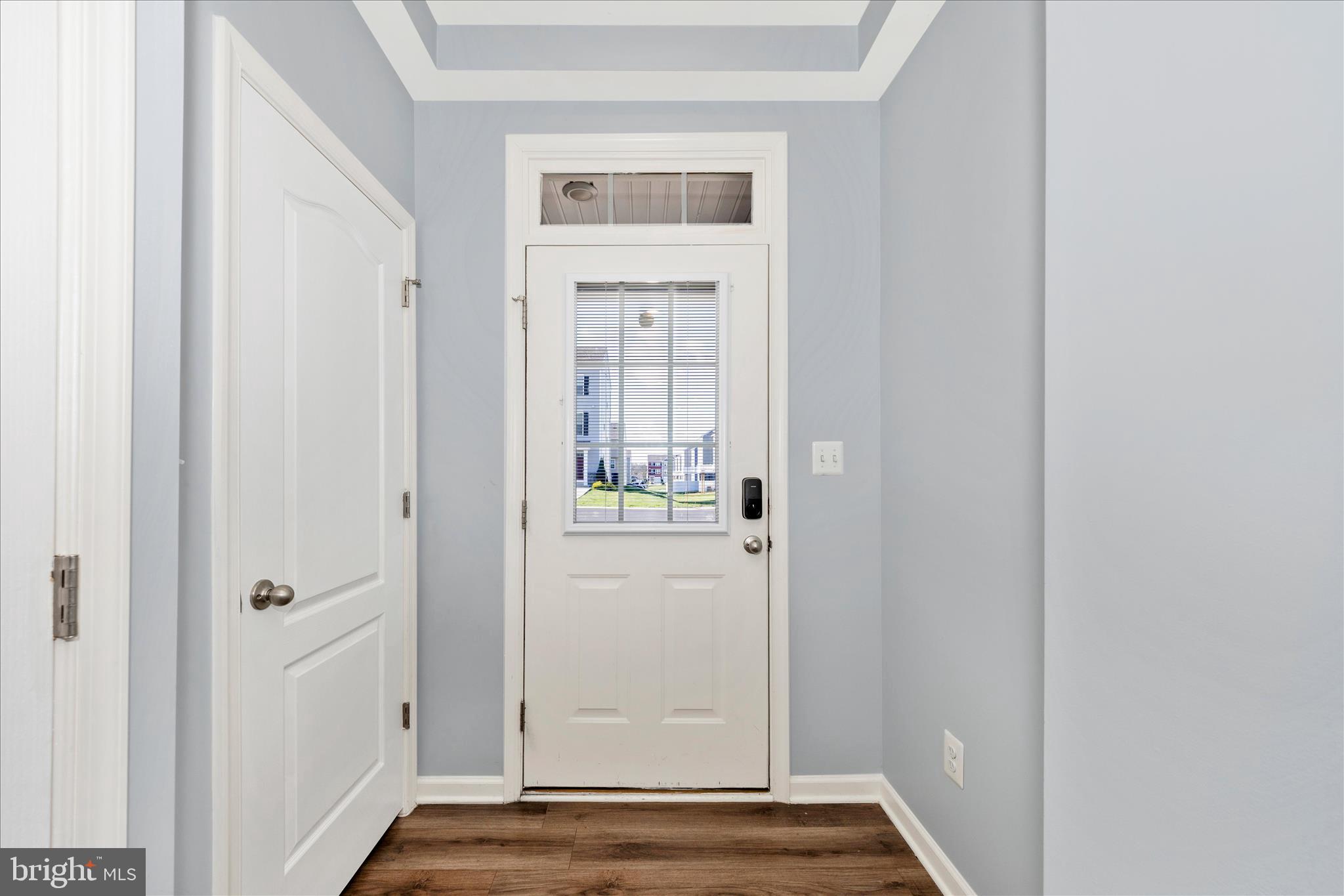 203 Charterhouse Street Falling Waters, WV 25419 - Photo 2 of 46 a view of a small space with wooden floor