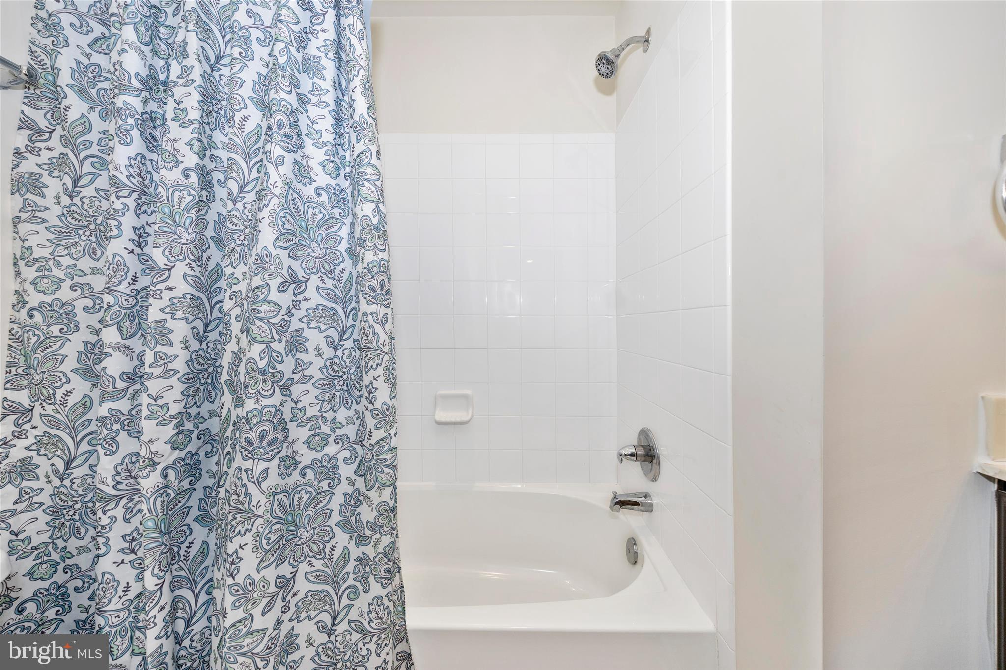 203 Charterhouse Street Falling Waters, WV 25419 - Photo 35 of 46 a bathroom with a bathtub