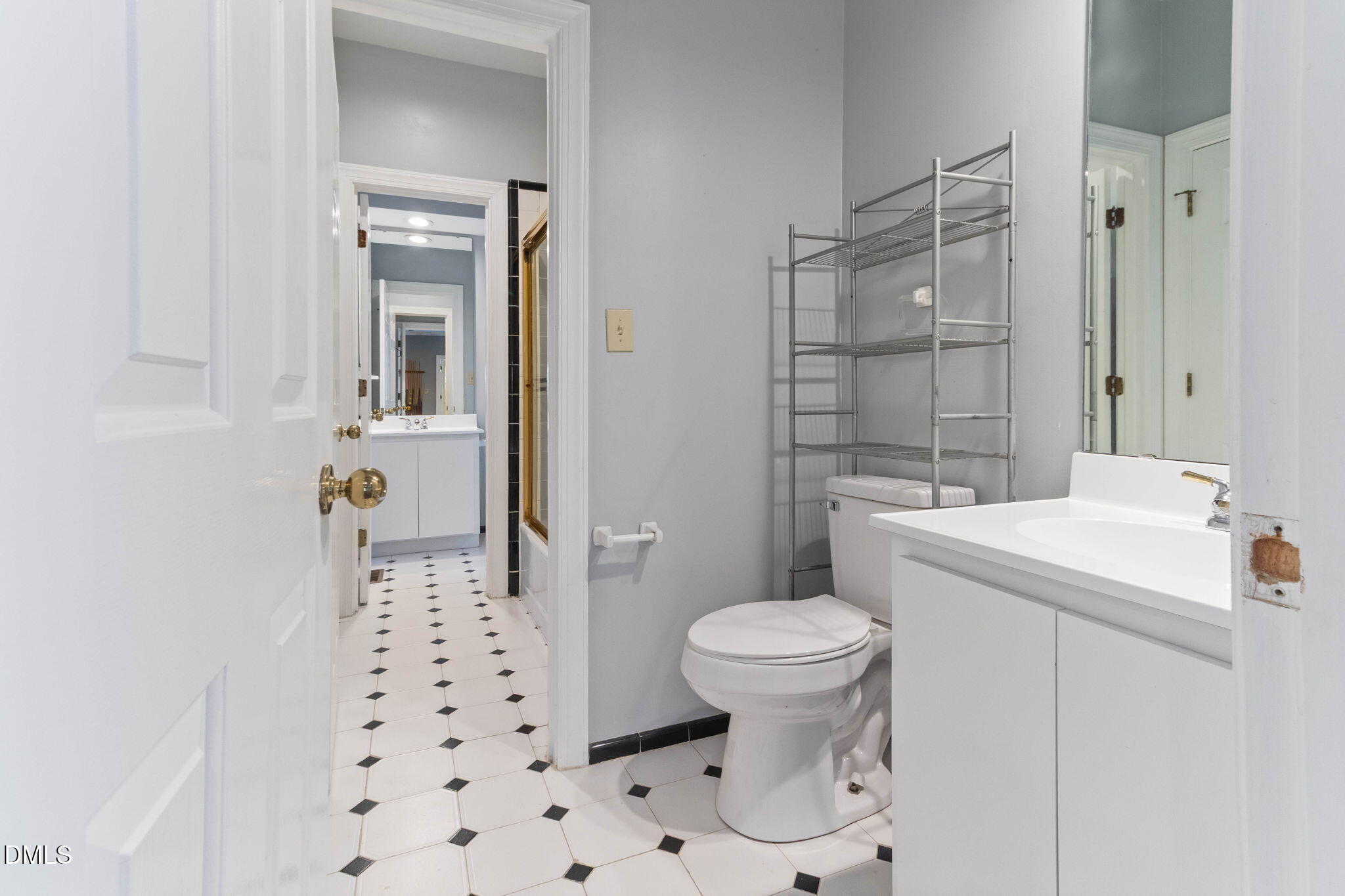 4205 Swarthmore Road Durham, NC 27707 - Photo 55 of 86 a bathroom with a sink toilet and shower
