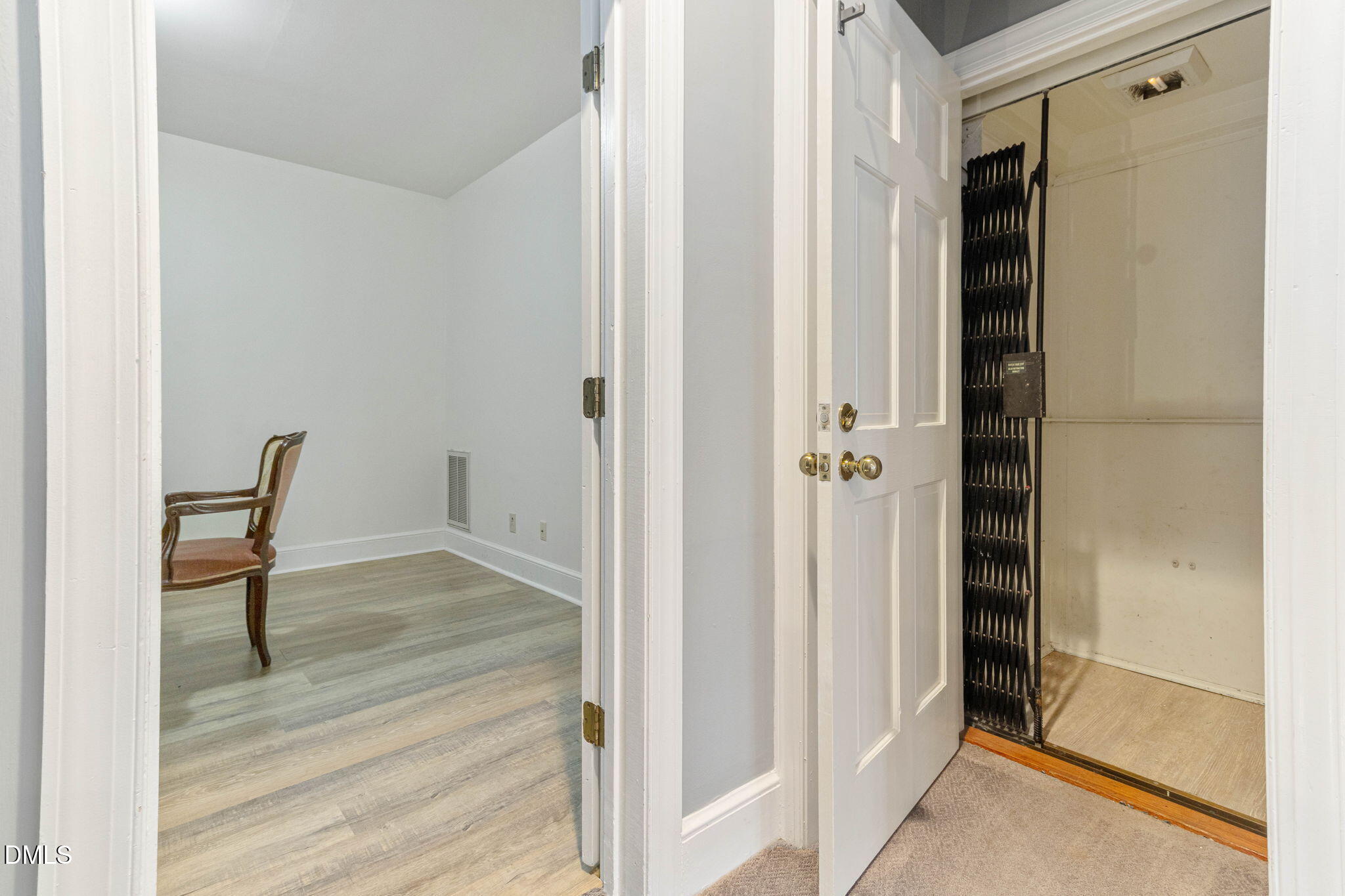 4205 Swarthmore Road Durham, NC 27707 - Photo 58 of 86 a view of a room with wooden floor and chair
