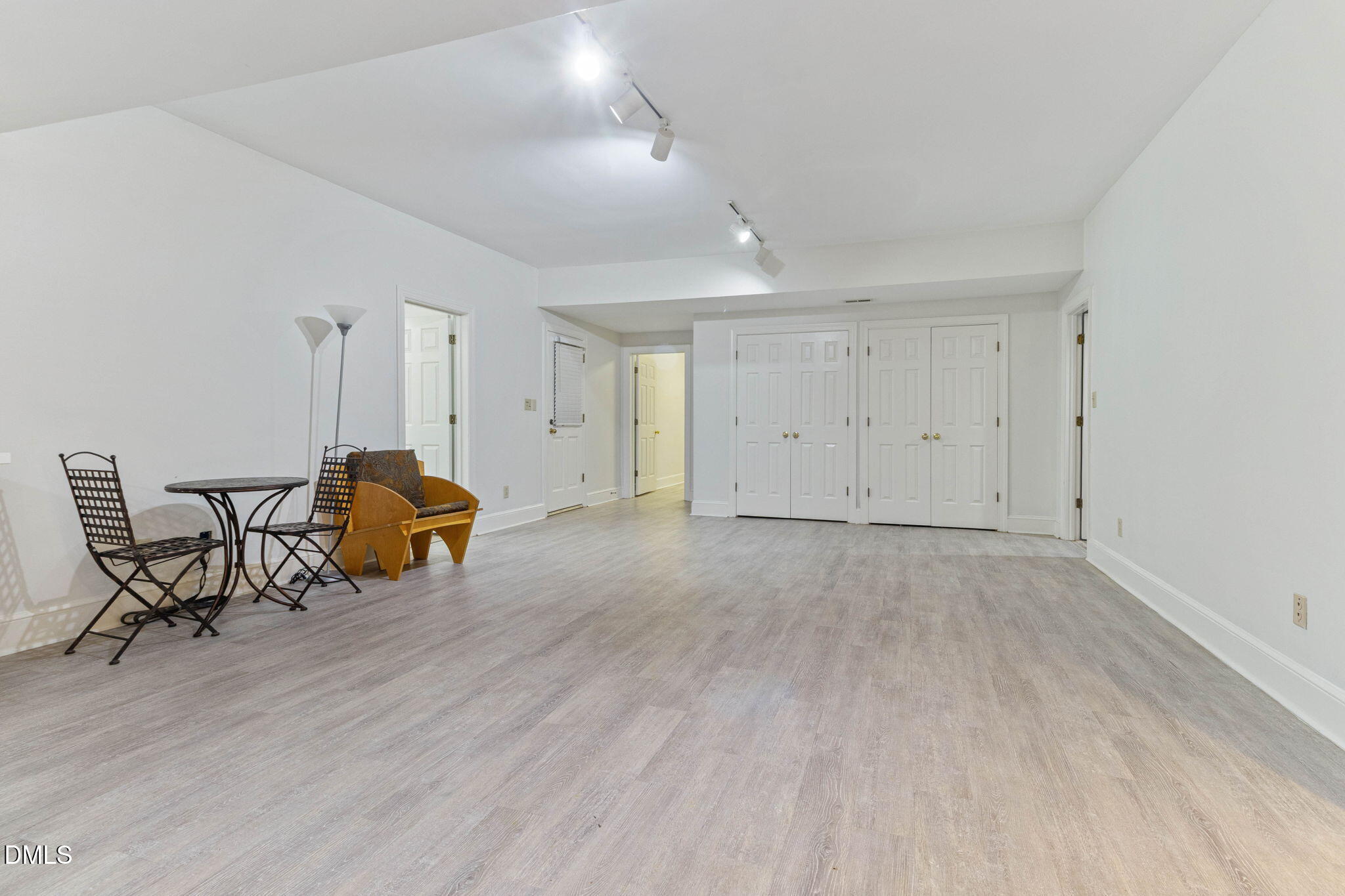4205 Swarthmore Road Durham, NC 27707 - Photo 61 of 86 an empty room with furniture and wooden floor