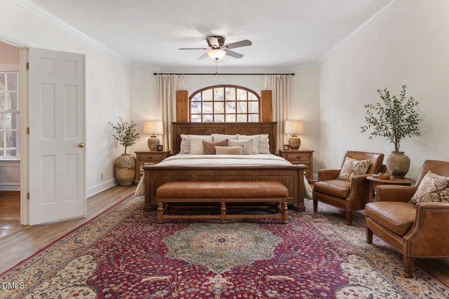 4205 Swarthmore Road Durham, NC 27707 - Photo 4 of 86 a bedroom with a bed a couch and a potted plant