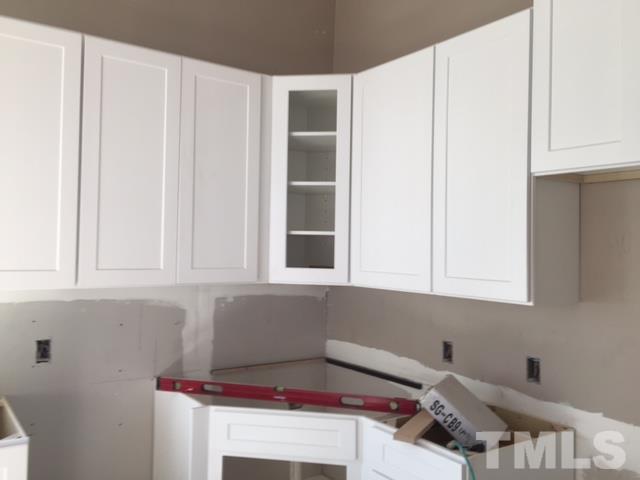 202 Heck Street Raleigh, NC 27601 - Photo 16 of 24 a view of cabinets and window