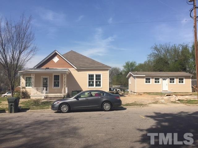 202 Heck Street Raleigh, NC 27601 - Photo 23 of 24 a front view of a house with a yard