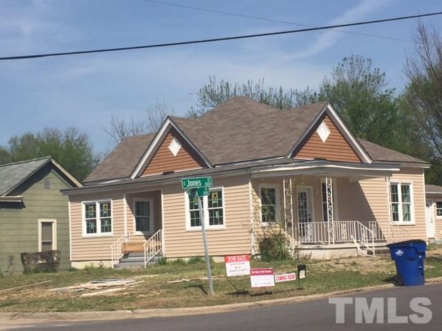 202 Heck Street Raleigh, NC 27601 - Photo 24 of 24 a front view of a house with a yard and garage