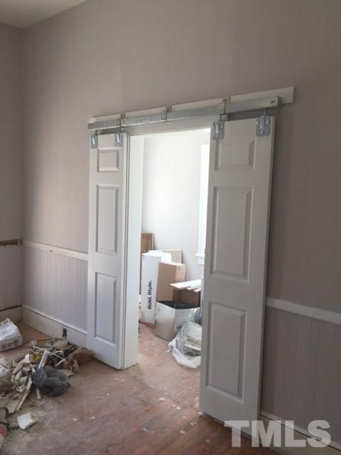 202 Heck Street Raleigh, NC 27601 - Photo 7 of 24 a bathroom with a shower and a toilet