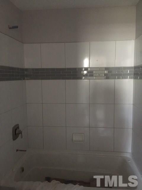 202 Heck Street Raleigh, NC 27601 - Photo 9 of 24 a bathroom with a shower