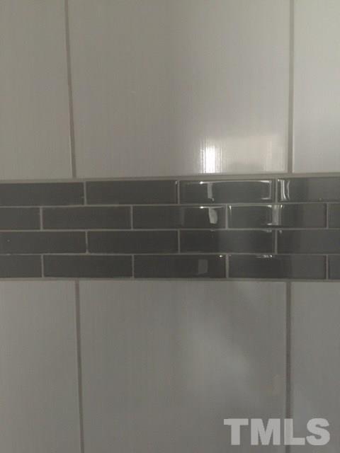 202 Heck Street Raleigh, NC 27601 - Photo 10 of 24 a bathroom with a shower