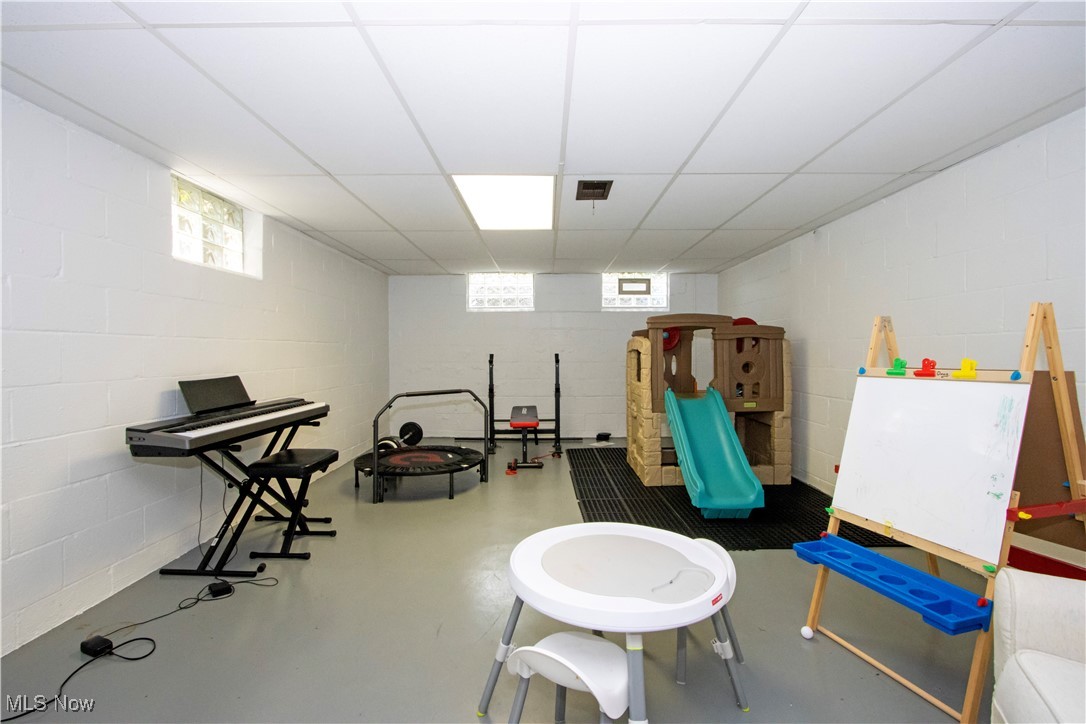 416 East Beverly Road Wooster, OH 44691 - Photo 34 of 36 Recreation room with concrete floors and concrete block wall