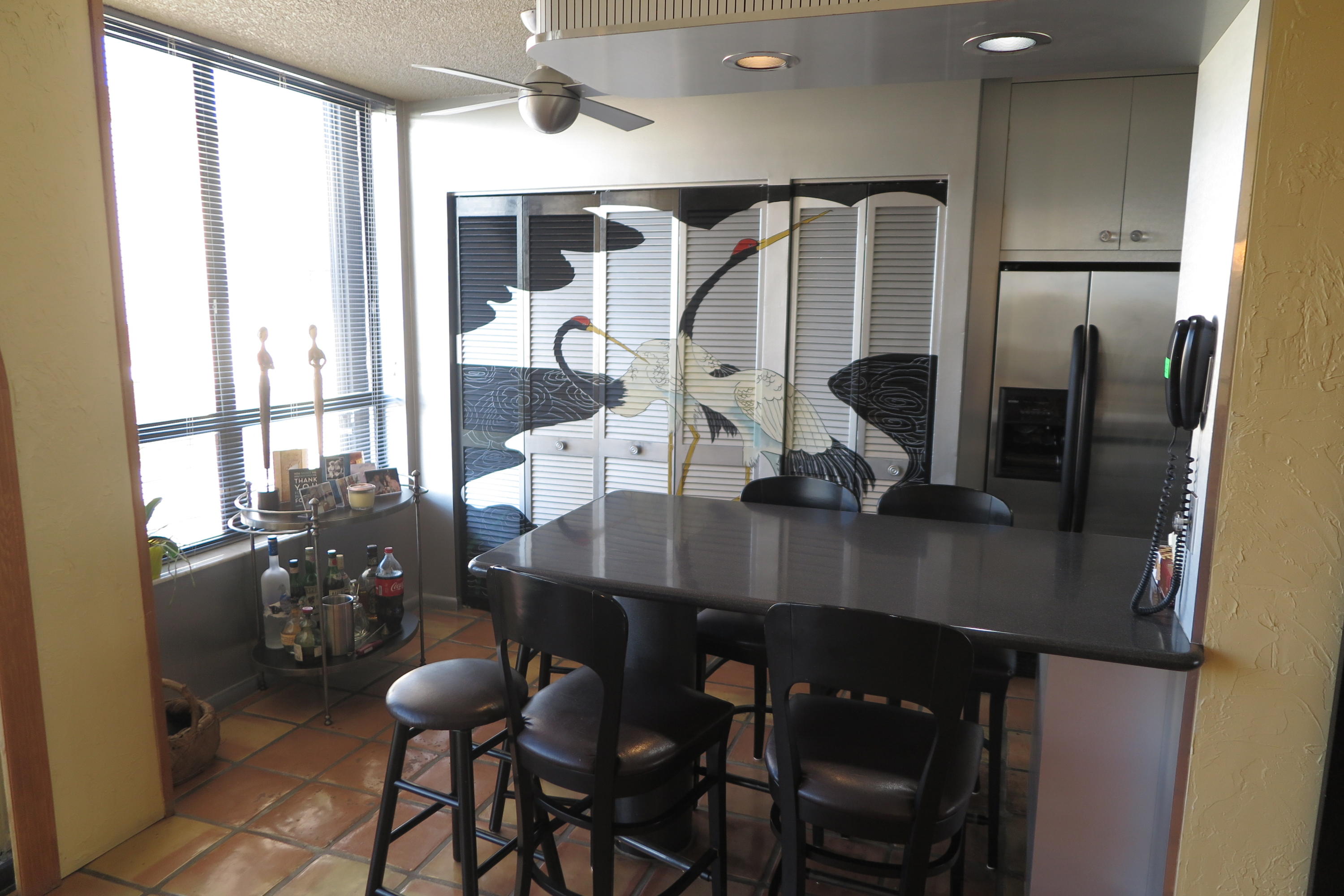 7186 Promenade Drive, Unit 801 Boca Raton, FL 33433 - Photo 5 of 21 a dining room with furniture and window