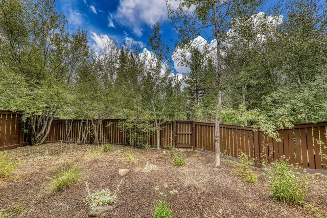 a house view with a backyard space
