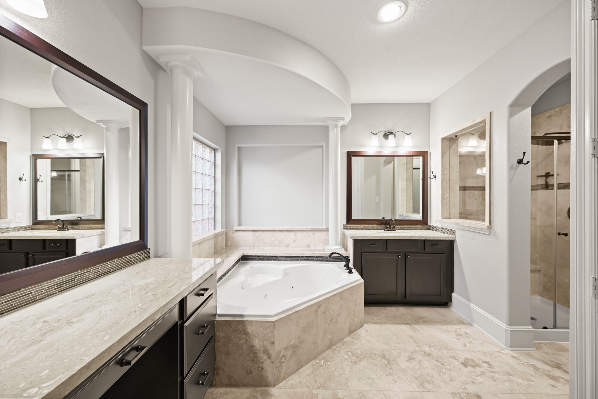 25202 Quiet Ledge Porter, TX 77365 - Photo 18 of 49 a large bathroom with a granite countertop tub sink and mirror