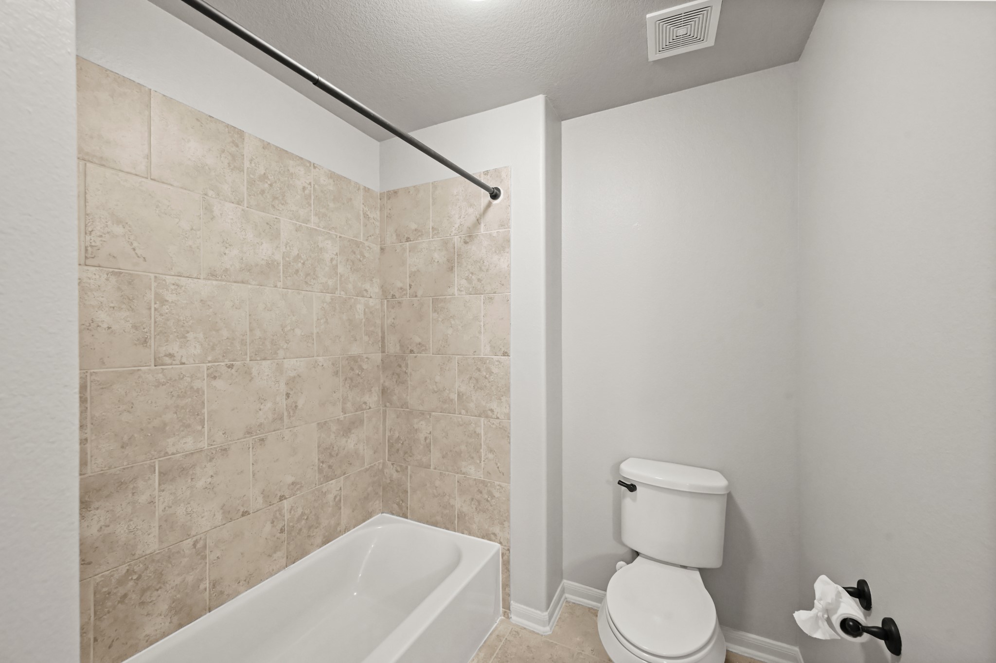 25202 Quiet Ledge Porter, TX 77365 - Photo 28 of 49 a white toilet sitting next to a bath tub