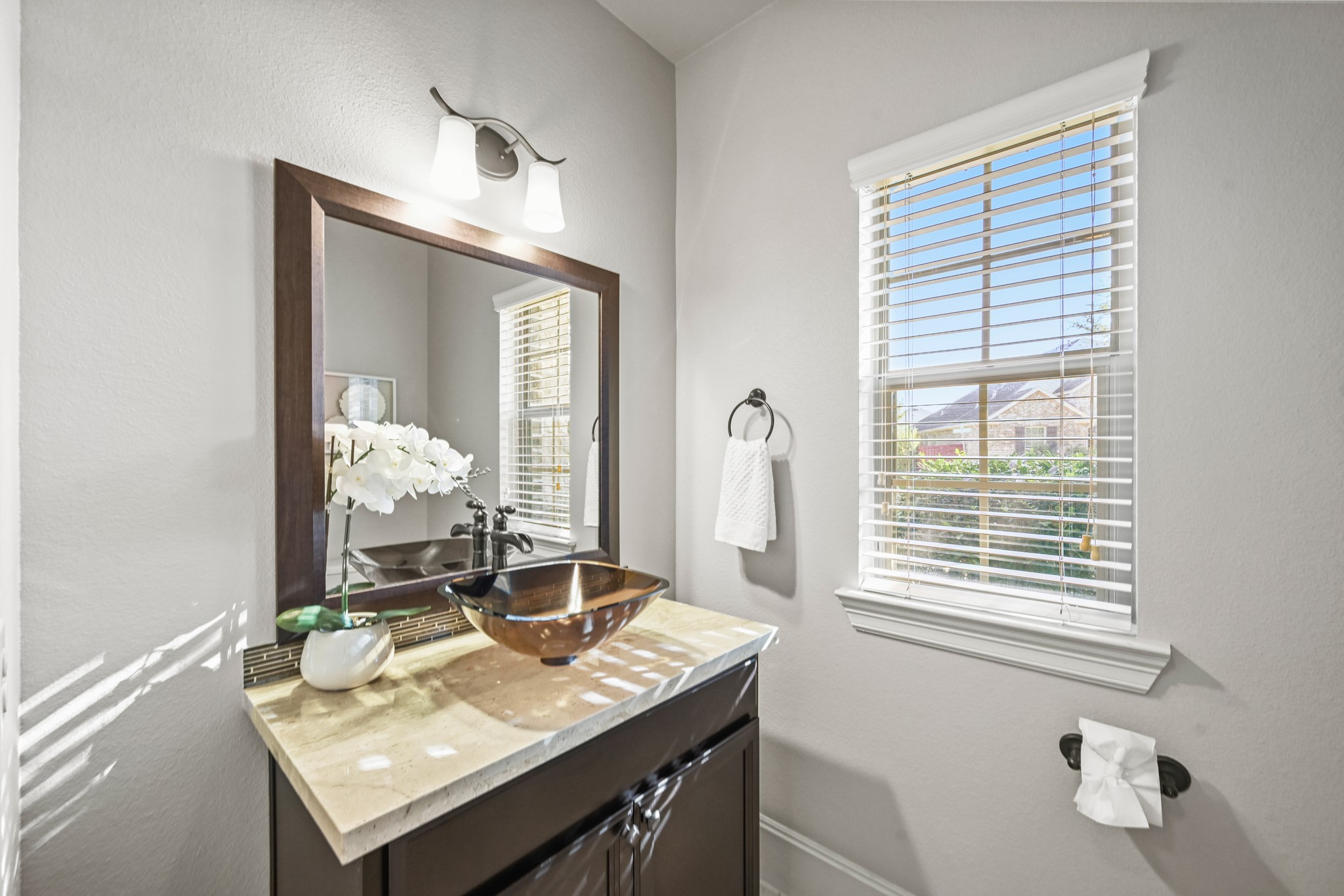 25202 Quiet Ledge Porter, TX 77365 - Photo 37 of 49 a bathroom with a sink and a mirror