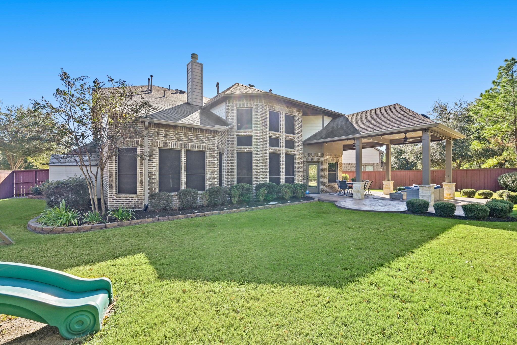 25202 Quiet Ledge Porter, TX 77365 - Photo 41 of 49 a front view of a house with a garden and yard