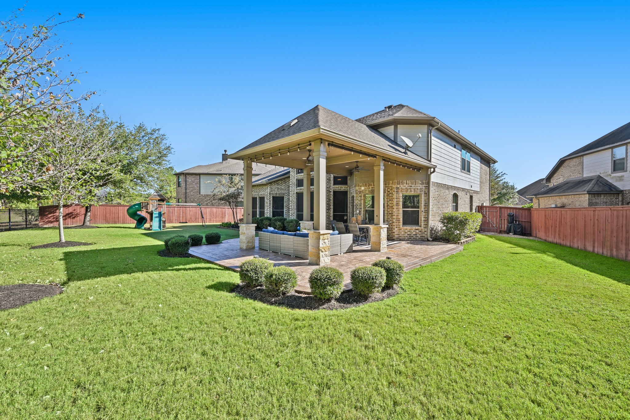 25202 Quiet Ledge Porter, TX 77365 - Photo 44 of 49 a view of a house with backyard porch and sitting area