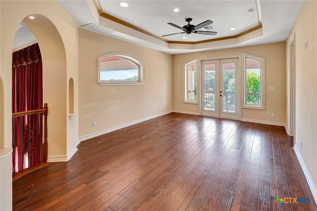 48 Post Oak Run Inez, TX 77968 - Photo 15 of 42 a view of an empty room with wooden floor and a window