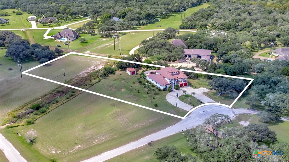 48 Post Oak Run Inez, TX 77968 - Photo 40 of 42 a view of a swimming pool with a yard and plants
