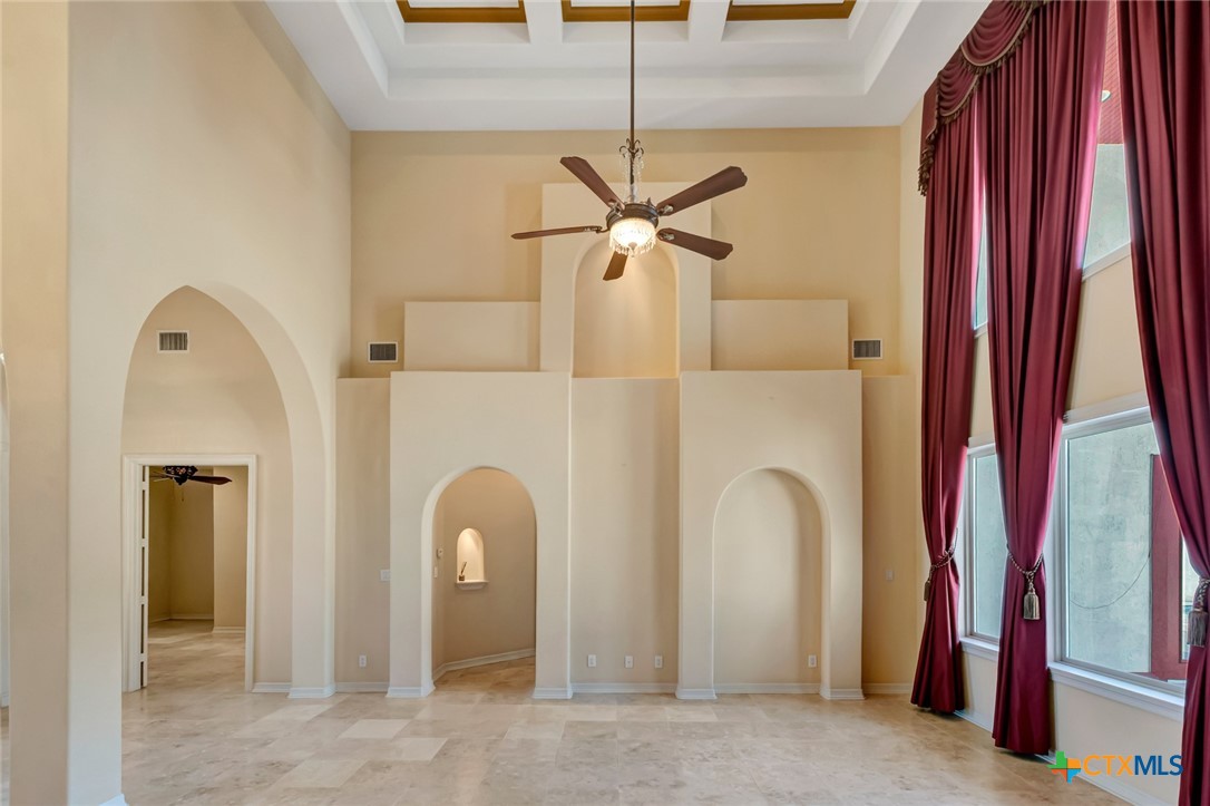 48 Post Oak Run Inez, TX 77968 - Photo 4 of 42 a view of a bathroom with a mirror and a ceiling fan