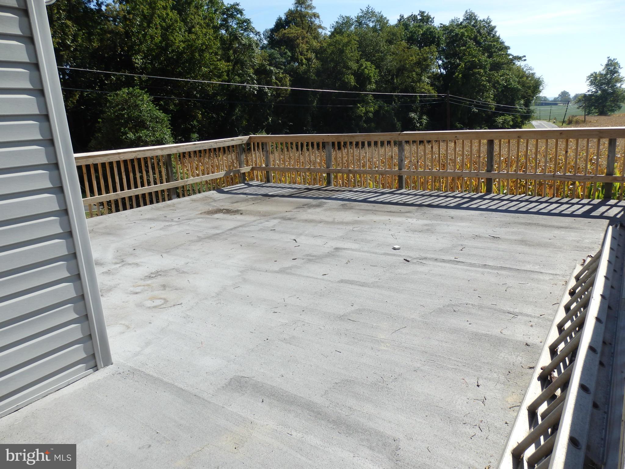 8607 Rocky Springs Road Frederick, MD 21702 - Photo 23 of 27 Deck extends over 2 car garage