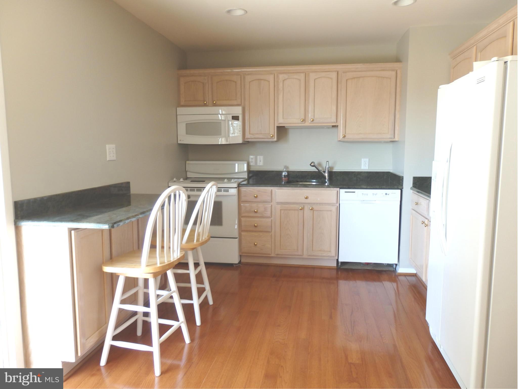 8607 Rocky Springs Road Frederick, MD 21702 - Photo 7 of 27 Hardwood floors and kitchenaid appliances