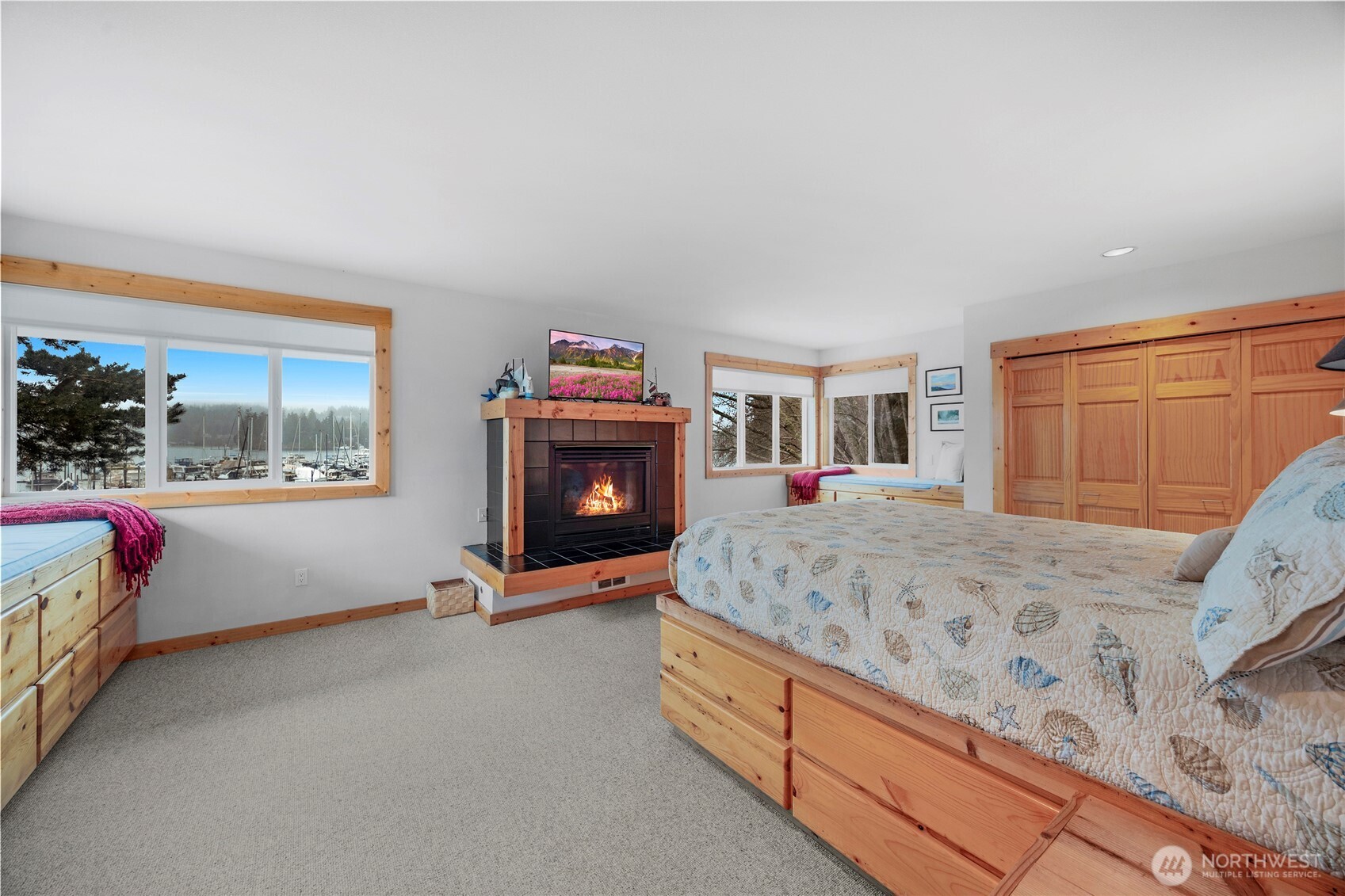 1 Pintail Road Port Ludlow, WA 98365 - Photo 16 of 36 a bed room with a bed and a tv