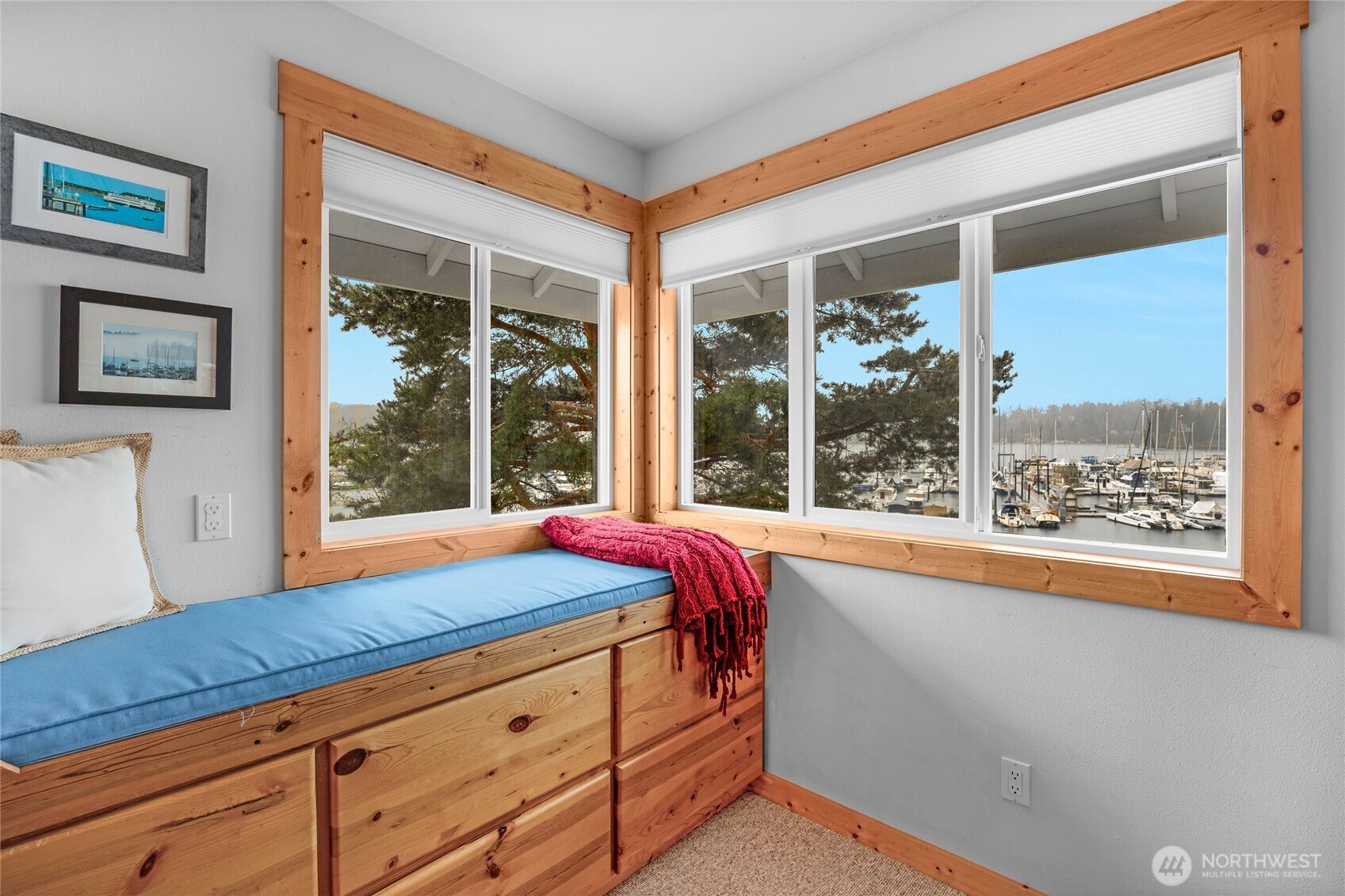 1 Pintail Road Port Ludlow, WA 98365 - Photo 17 of 36 a bedroom with a bed and a large window with outer view