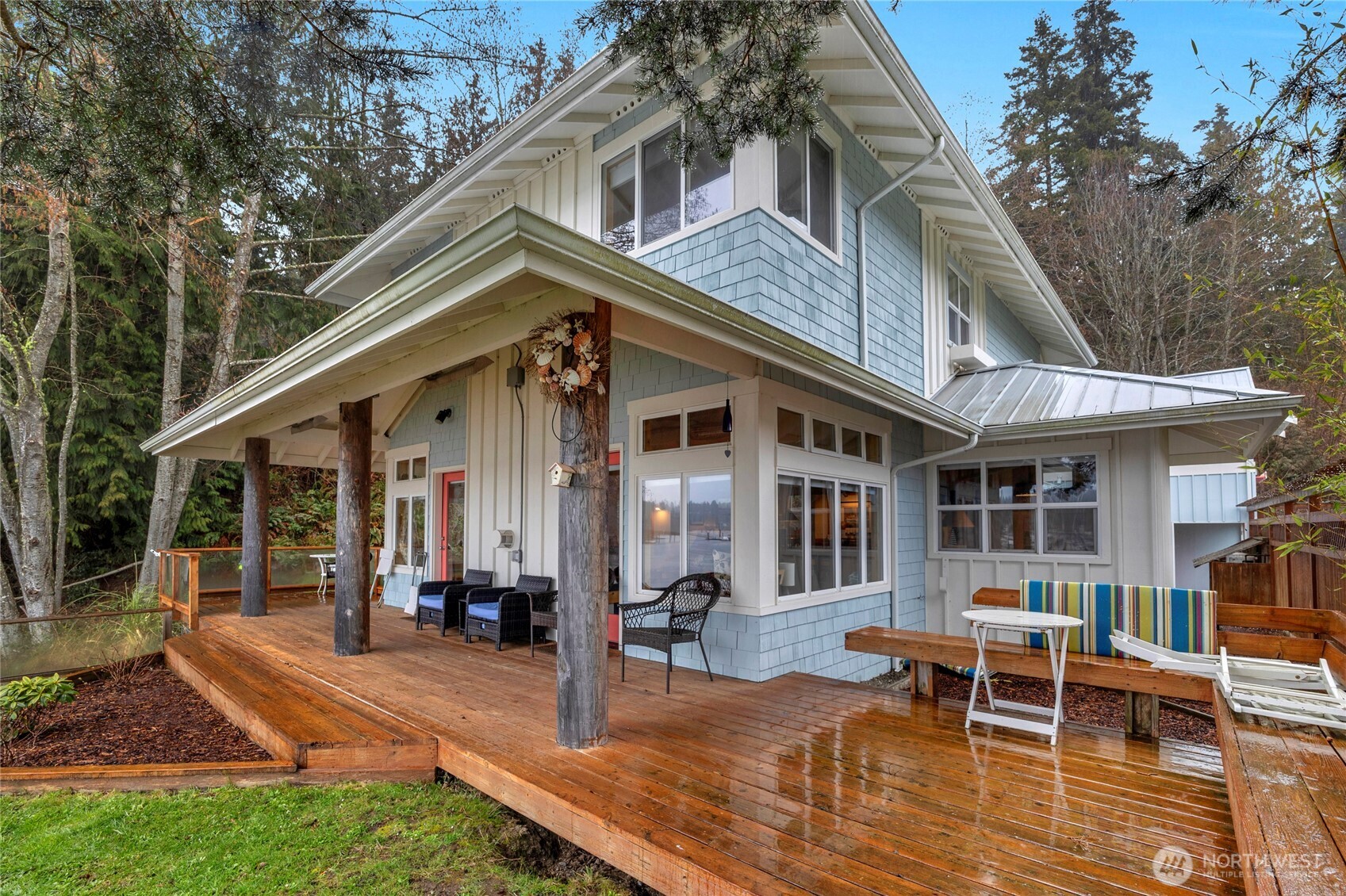 1 Pintail Road Port Ludlow, WA 98365 - Photo 24 of 36 a view of a house with backyard porch and sitting area