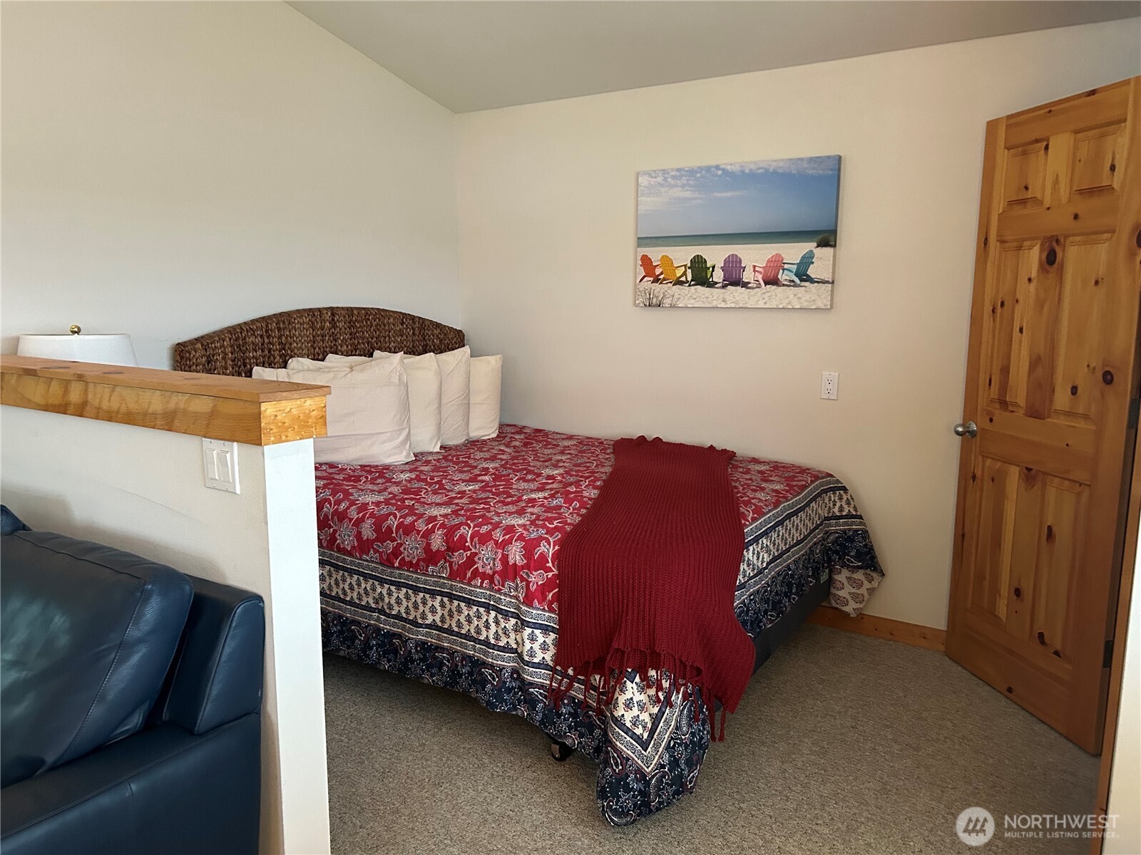 1 Pintail Road Port Ludlow, WA 98365 - Photo 32 of 36 a bedroom with a bed and a painting on the wall