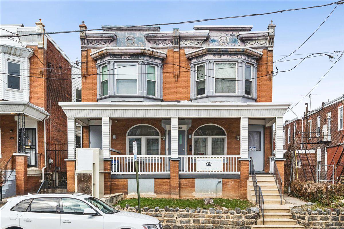 Charming Double Lot Property with classic details.