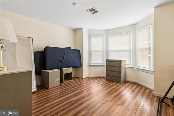a room with furniture and a window