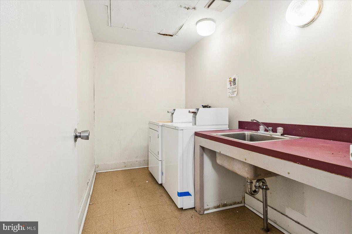 5205-07 Webster Street Philadelphia, PA 19143 - Photo 20 of 37 a utility room with dryer and washer