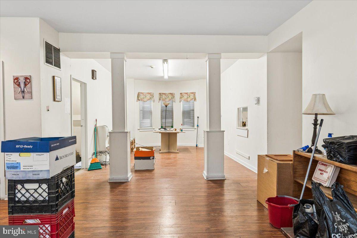5205-07 Webster Street Philadelphia, PA 19143 - Photo 3 of 37 a living room with furniture and wooden floor